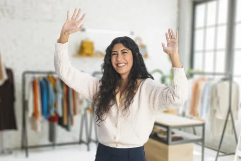 happy retail manager in decluttered retail space